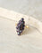 Bague 55 Bague marquise en or rose 18kt et grenats sur paillon 58 Facettes