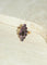 Bague 55 Bague marquise en or rose 18kt et grenats sur paillon 58 Facettes