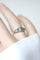 Bague 51 Bague jarretière en or rose 14Kt et argent, diamants taillés en table et rose 58 Facettes