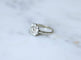 Bague 56 Bague marguerite Art Déco en or blanc et platine et diamants 58 Facettes