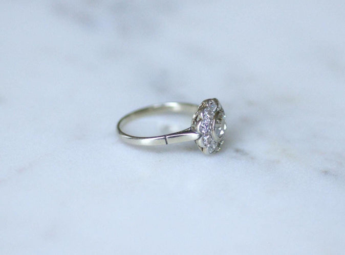 Bague 56 Bague marguerite Art Déco en or blanc et platine et diamants 58 Facettes