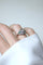 Bague 55 Bague dôme Art déco en or rose et platine, émeraudes et diamants 58 Facettes