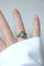 Bague 55 Bague dôme Art déco en or rose et platine, émeraudes et diamants 58 Facettes