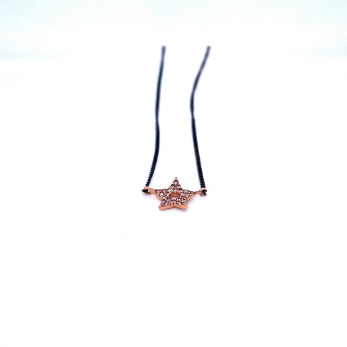 Collier Collier - Pendentif étoile en or noir 14k et diamants 58 Facettes