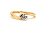 Bague contemporaine en or jaune et blanc 18 carats sertie d'un diamant "taille" brillant (+-0.16ct)