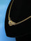 Collier Collier en or jaune 18 carats avec motif central en diamant 58 Facettes AB233