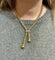 Collier Collier maille Popcorn à pompons en or 18 carats 58 Facettes