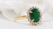 Bague 60 Bague marguerite en or jaune, émeraude ovale et diamants 58 Facettes 30768