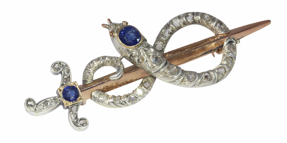 Broche Broche antique en or, diamant et saphir, serpent enroulé autour d'une épée ou d'un poignard 58 Facettes 22297-0136