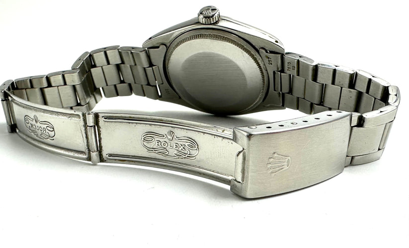 Montre ROLEX - Date réf. 1500 verre plexi 58 Facettes