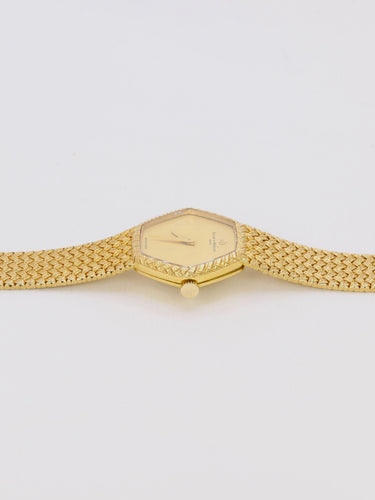 Montre BAUME & MERCIER - Montre vintage or jaune maille tressée 58 Facettes 1067.3