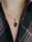 Pendentif Pendentif charms vintage pichet or jaune émail bleu 58 Facettes 1099.11