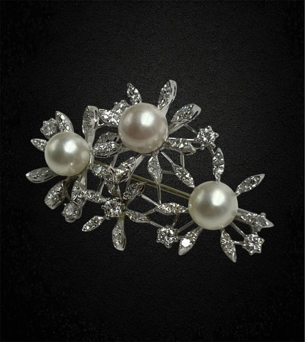 Broche Broche raffinée « marguerite » avec perles et diamants 58 Facettes