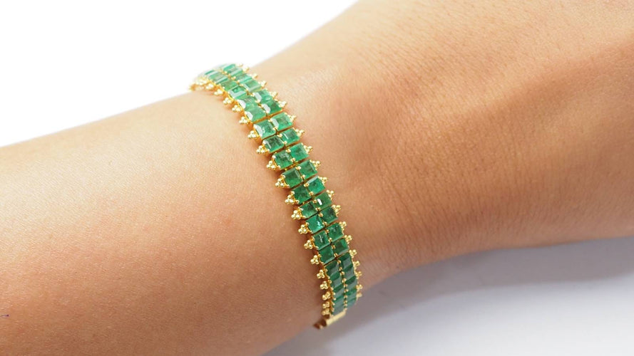 Bracelet Bracelet souple ancien en or jaune et émeraudes 58 Facettes 32752