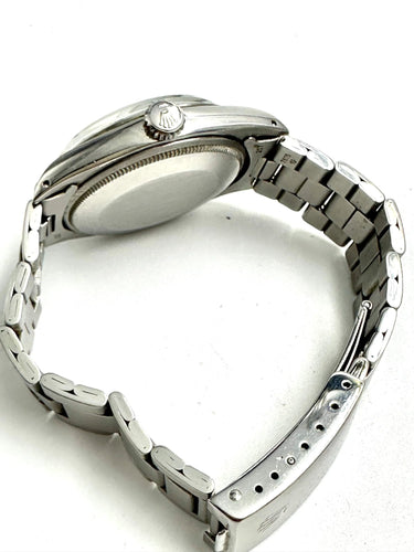 Montre ROLEX - Date réf. 1500 verre plexi 58 Facettes