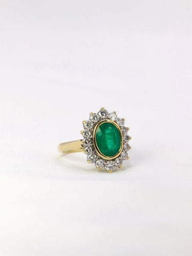 Bague Bague marguerite émeraude ovale diamants 58 Facettes J396