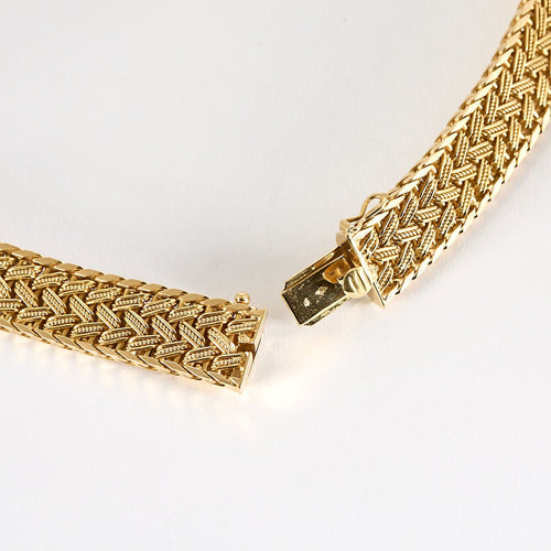 Collier Collier négligé en or jaune tressé 58 Facettes MON0828