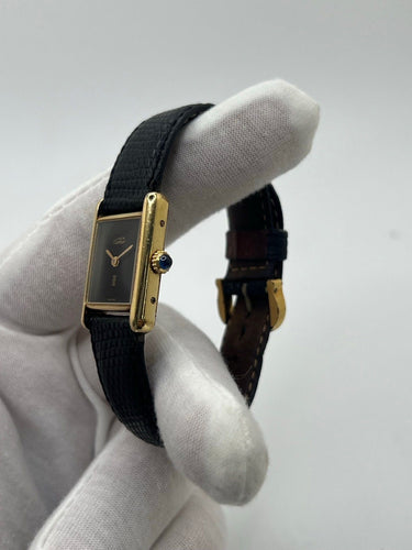 Montre Cartier - Montre Tank Must Vermeil cadran noir 20 x 28 mm 58 Facettes