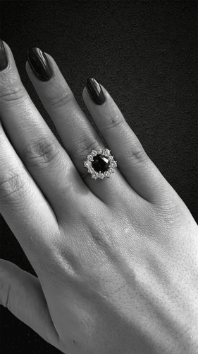 Bague Bague hexagonale sertie de diamants et ornée d'un saphir central 58 Facettes