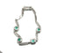 Bracelet Bracelet en or blanc à maillons rectangulaires, diamants et émeraudes 58 Facettes 50399
