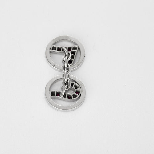Boutons de manchette Boutons de manchettes en or gris et rubis 58 Facettes CAN1149