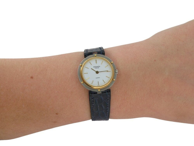 Montre vintage montre HERMES clipper 26 mm en or 18k et acier quartz  lady 58 Facettes 268714