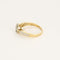 Bague en or jaune et or blanc à motif de fleur, diamants
