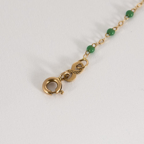 Bracelet GIGI Clozeau - Classique Gigi - Bracelet en or jaune et résine verte 58 Facettes BRI0094X3