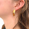 Boucles d'oreilles Boucles d'oreilles modernistes, or jaune, diamants, citrines. 58 Facettes 33616