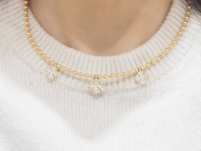 Collier Collier boules rigide et trèfles en or rose et diamants 58 Facettes 33100