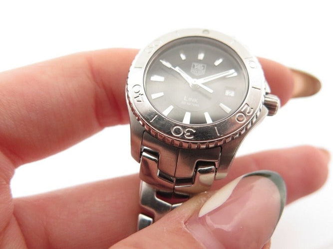 Montre montre TAG HEUER link lady 27 mm quartz acier palladie 58 Facettes 259317