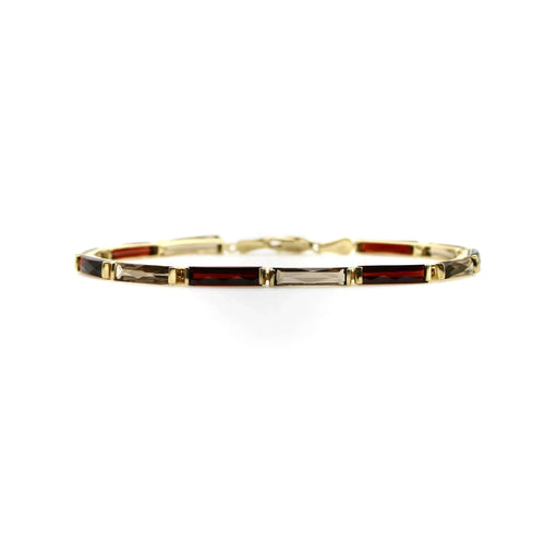 Montre Bracelet vintage en or 14 carats avec grenat et quartz fumé 58 Facettes A2000P
