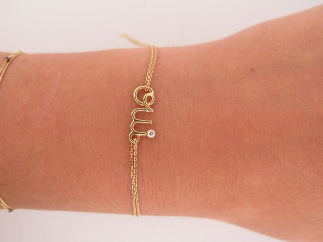 Bracelet bracelet christian DIOR DIORamour 16 or jaune 58 Facettes 263608