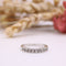 Bague Alliance demi-tour or blanc et diamants serti rail 58 Facettes