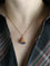 Pendentif Pendentif charms vintage cloche or jaune pierre bleue 58 Facettes 1099.6