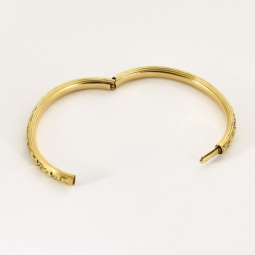 Bracelet Bracelet jonc en or jaune à motif végétal 58 Facettes SOR1095