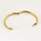 Bracelet Bracelet jonc en or jaune à motif végétal 58 Facettes SOR1095