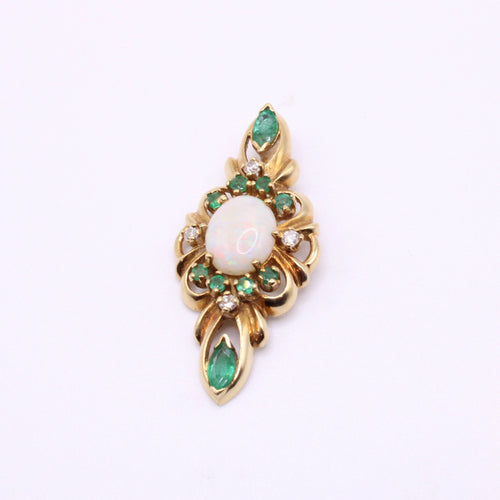Pendentif Pendentif or jaune serti d’émeraudes, diamants et opale 58 Facettes