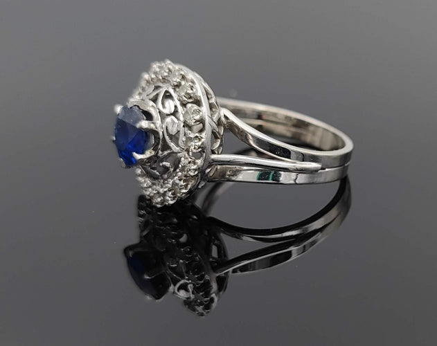 Bague 50 Bague or gris et platine, saphir, diamants 58 Facettes
