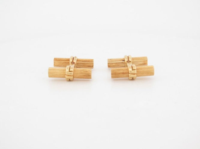 Boutons de manchette boutons de manchettes BOUCHERON en or 19 batonnets faisceaux 58 Facettes 260635
