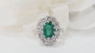 Bague 51 Bague marguerite en or blanc, émeraude et diamants 58 Facettes F4947