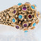 Bague 60.5 Bague Art Déco or jaune 19 carats, turquoise et rubis 58 Facettes