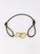 Bracelet Dinh Van - Bracelet double coeur or jaune cordon kaki 58 Facettes 1027.2