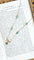Collier Collier noeud or et cabochons émeraude 58 Facettes