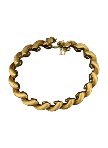 Bracelet Bracelet tressé plaqué or 18 carats 58 Facettes