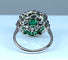 Bague Bague marguerite en or blanc 18 carats en émeraudes et diamants 58 Facettes AB216