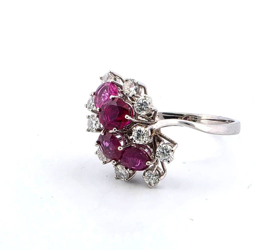Bague 61 Bague en or blanc 18 carats sertie de rubis et de diamants, référence C 261 25 (2005) 58 Facettes