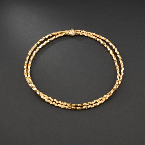 Collier Collier en or jaune 18K à deux rangs, signé MELLERIO. 58 Facettes