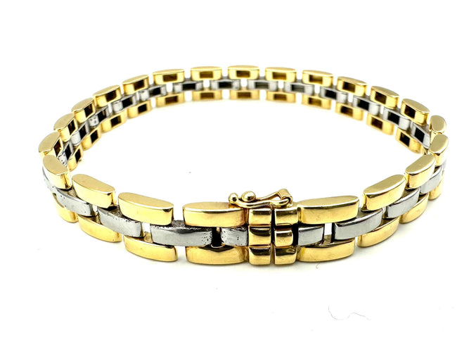 Bracelet CARTIER. Collection "Panthère", bracelet or jaune et acier (full set) 58 Facettes