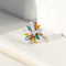 Bague vintage en or blanc sertie de diamants blancs et colorés